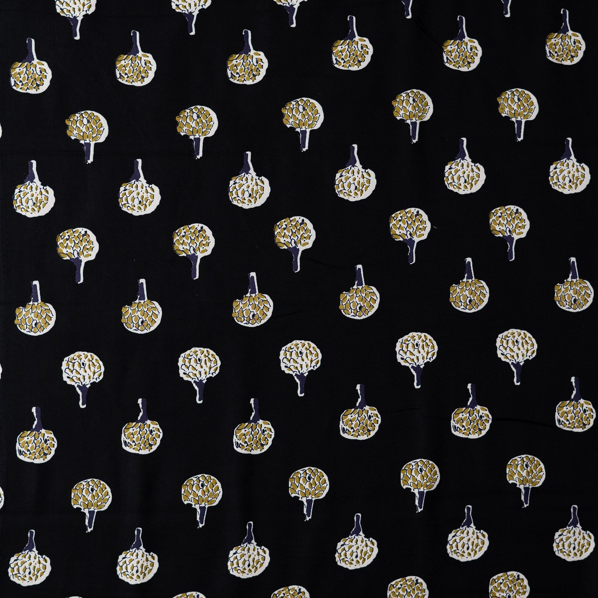Black color rayon fabric with white , navy blue and green color prints.