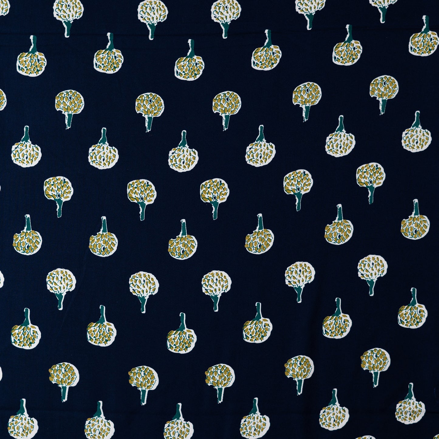 Blue color rayon fabric with white , navy blue and green color prints