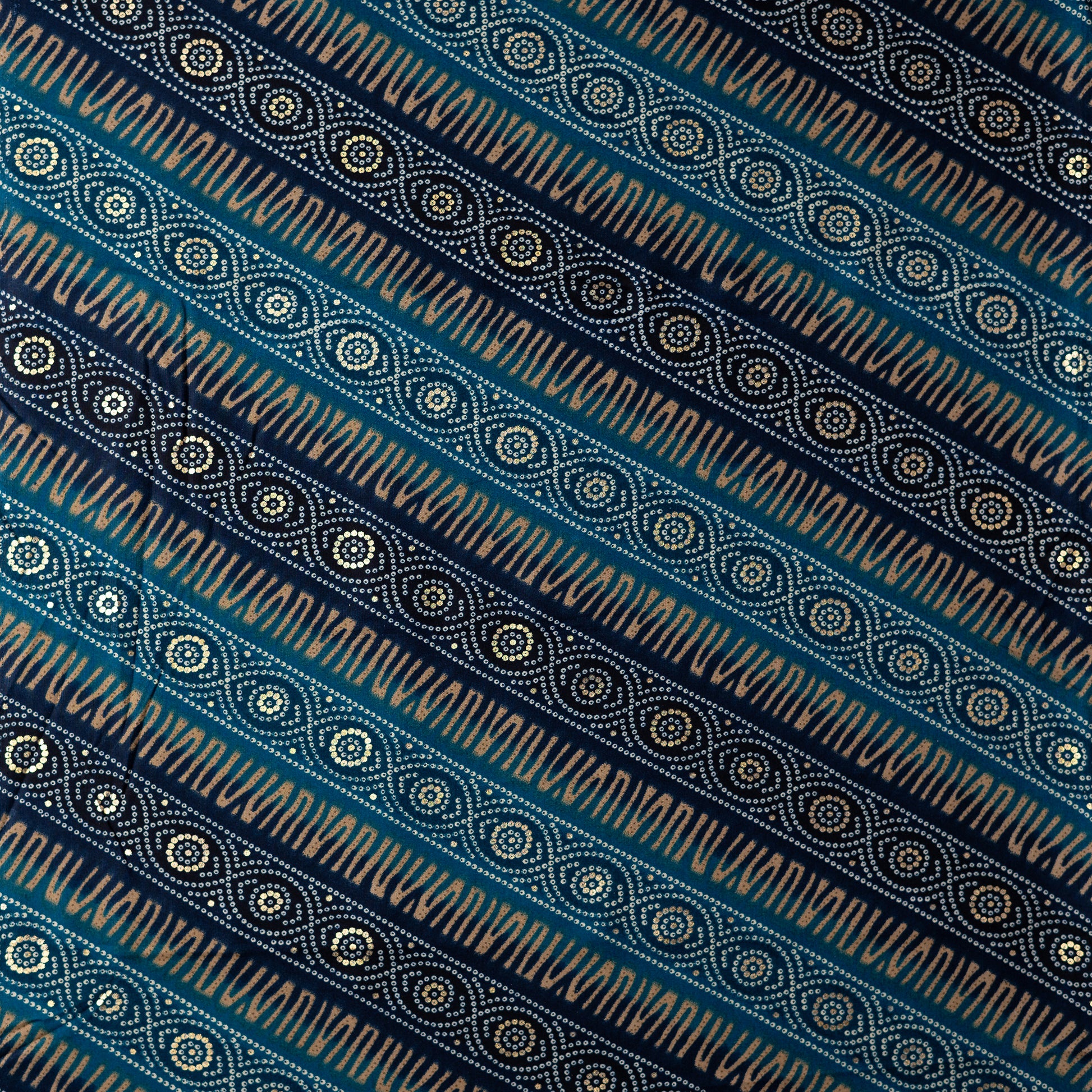 blue color rayon fabric with gold color print design