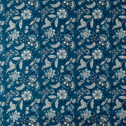 close up view of cotton printed fabric in blue color, it has 44 inches width, you can buy as many meters as per your requirement