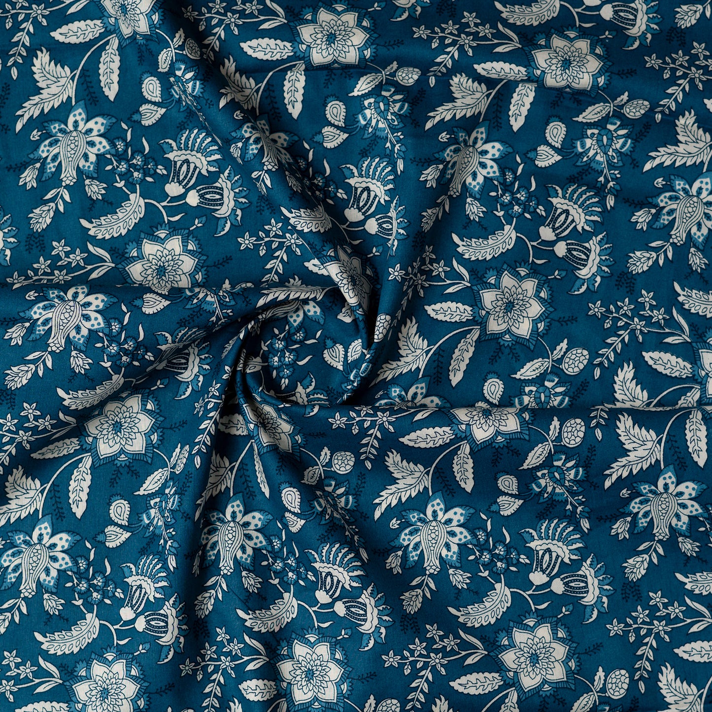 cotton printed fabric in blue color, it has 44 inches width, you can buy as many meters as per your requirement