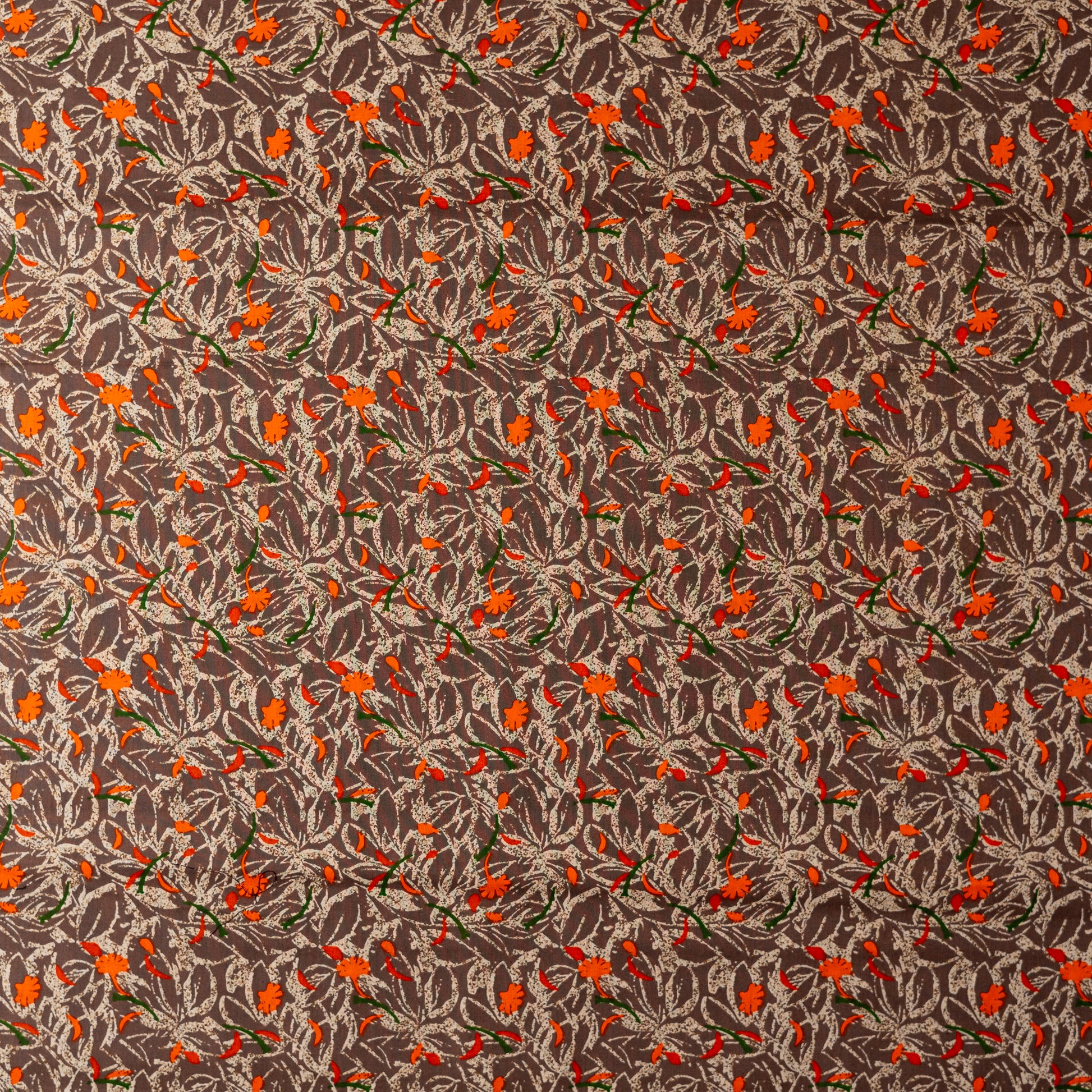 beautiful brown color cotton fabrics with orange, cream and green color prints