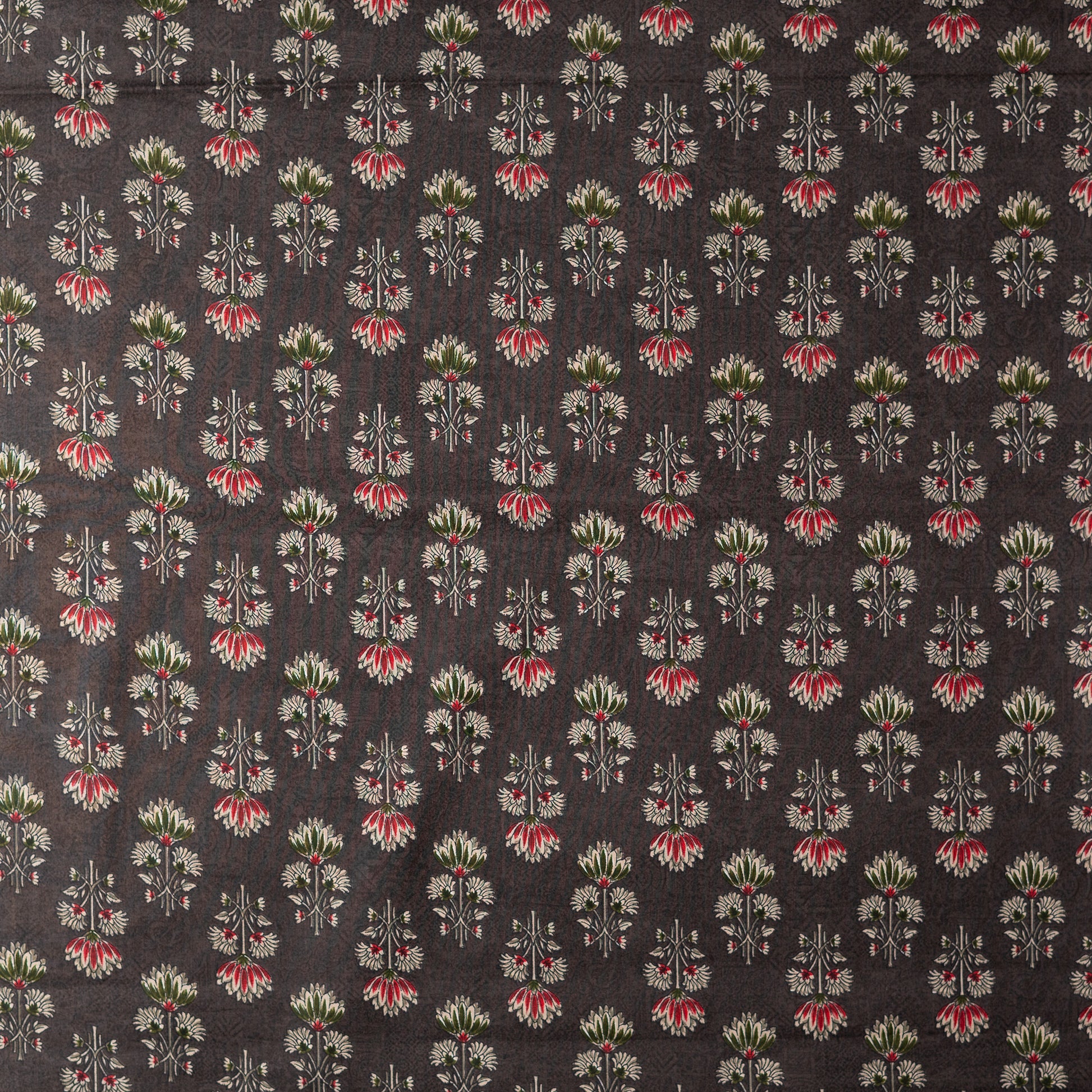 dark brown color printed fabric with maroon, green and cream color beautiful prints