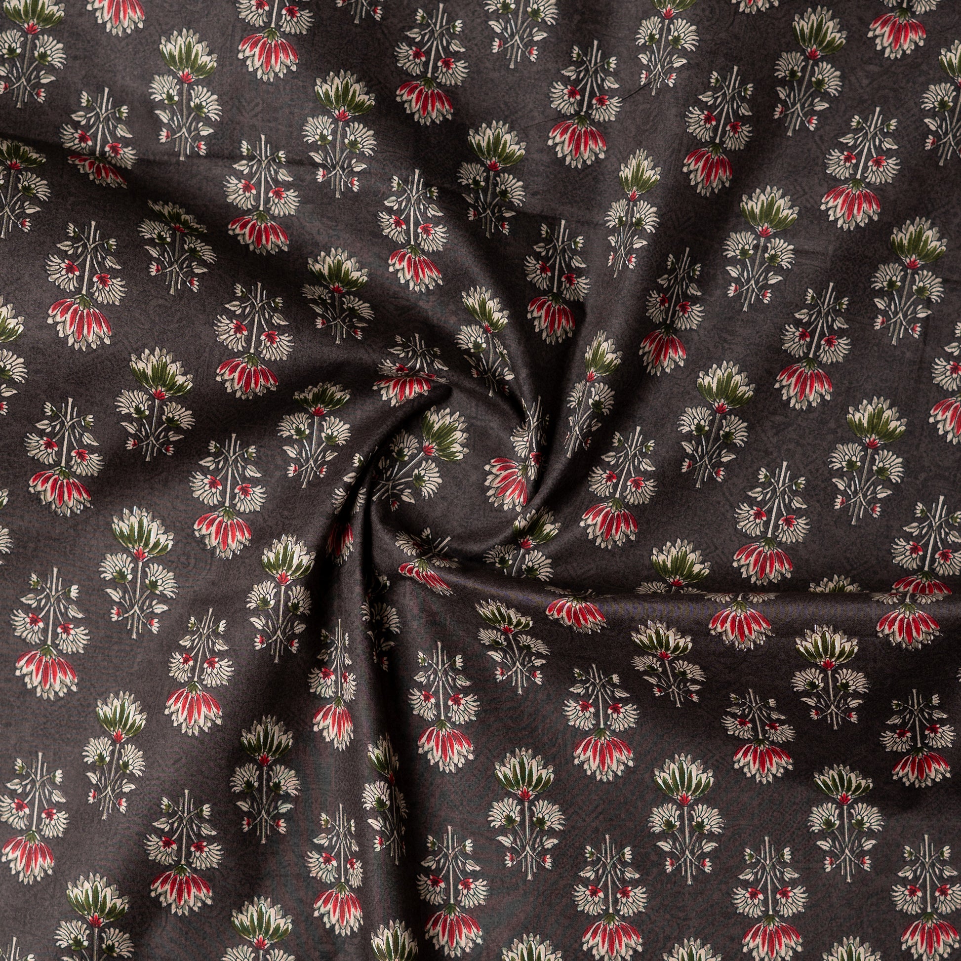 dark brown color printed fabric with maroon, green and cream color beautiful prints