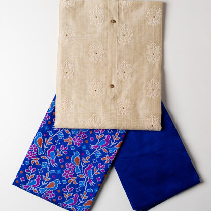Chanderi silk dress material with embroidery and sequins work, the embroidery work is done with the same color thread of the top which gives a very elegant look. The top has show buttons, golden color piping in the border. Colorful digital printed silk dupatta , royal blue color cotton silk bottom