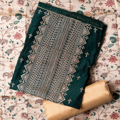 Chanderi silk bottle green color top with sober embroidery work in middle and small elegant embroidery all over the body. Digital printed silk dupatta , Cotton silk cream color botto