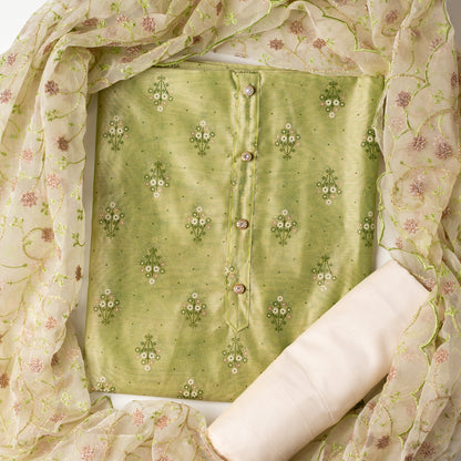 Chanderi silk dress material, light green color top with print design, multi color prints along with gold color . it has show buttons on the neck area. Silk dupatta with very beautiful embroidery work in light green color and golden zari work. Cotton silk plain cream color bottom