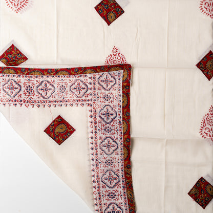 cotton cream color dupatta with cut work on the body and print design at the borders. 