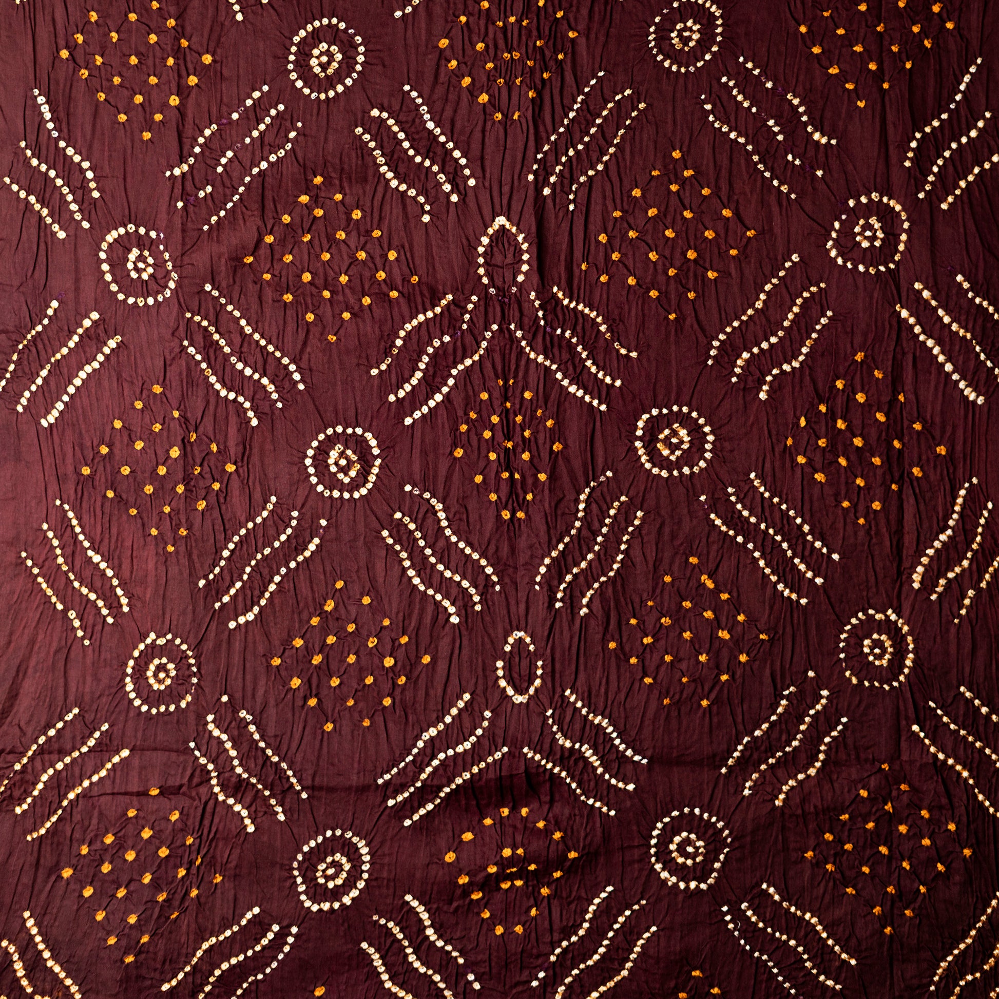 brown color cotton bandhani top with yellow and white color bandhej design.
