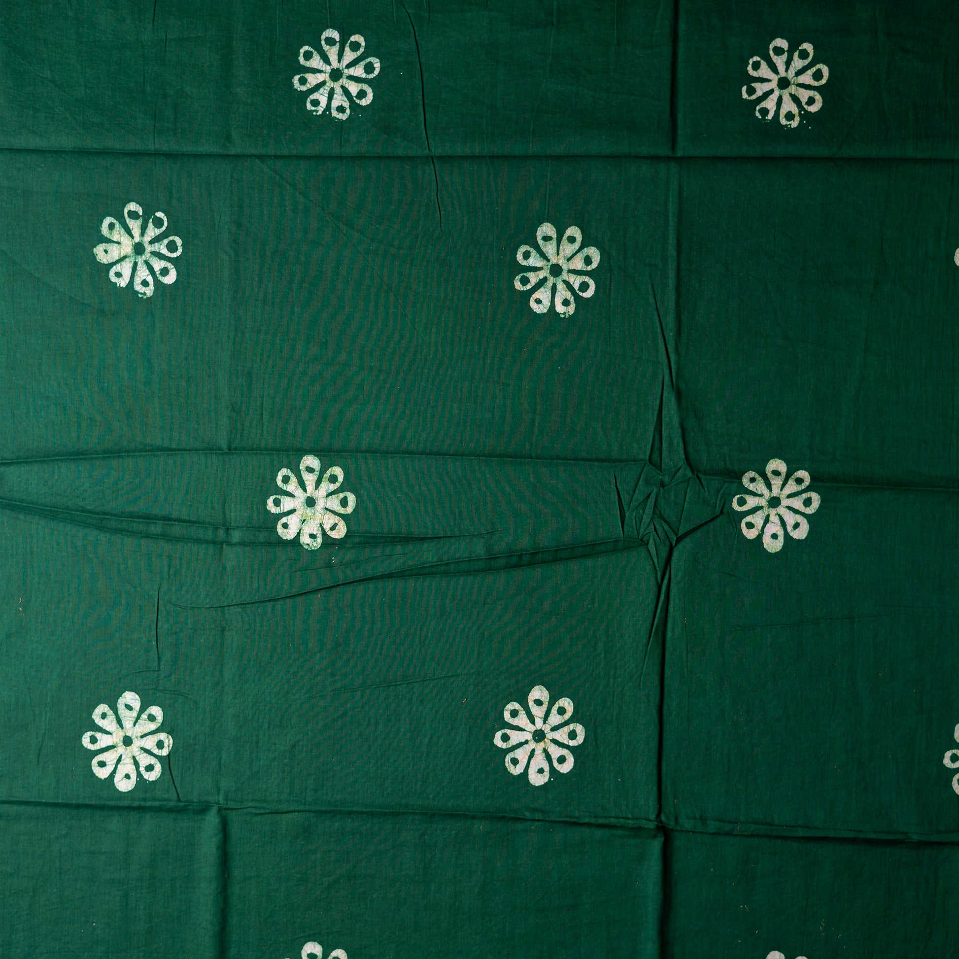 Cotton green color bottom with batik prints. 