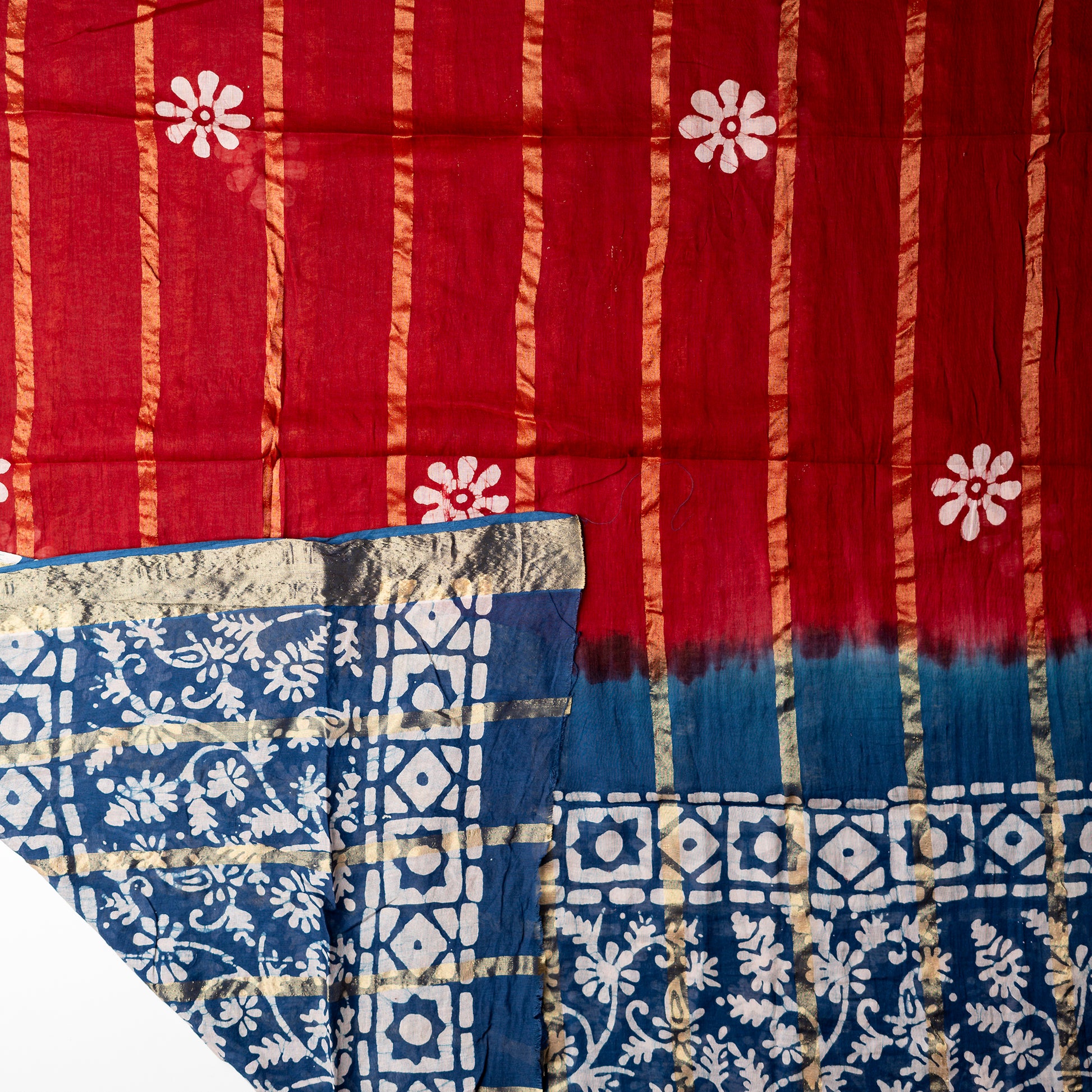 Red and blue color cotton dupatta with golden color lines in between and also wax batik prints