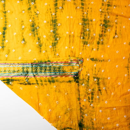 yellow color dupatta with green color shibori print designs and white bandhej designs, it has multi color border