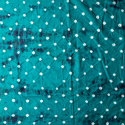 Teal blue color bottom with shibori designs in navy. 
