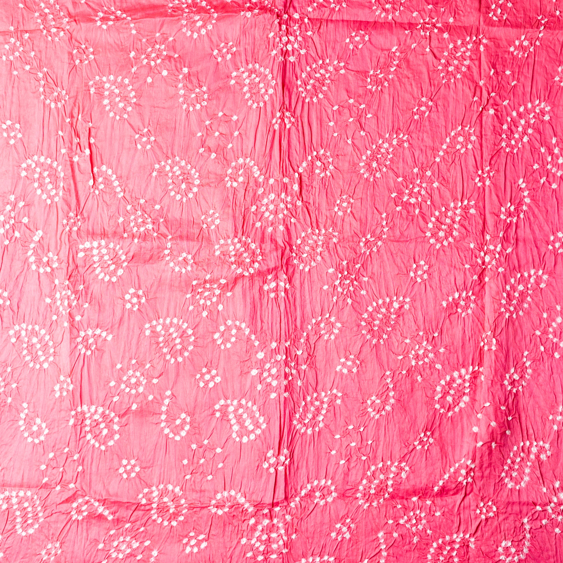 Pink color top with white bandhej designs