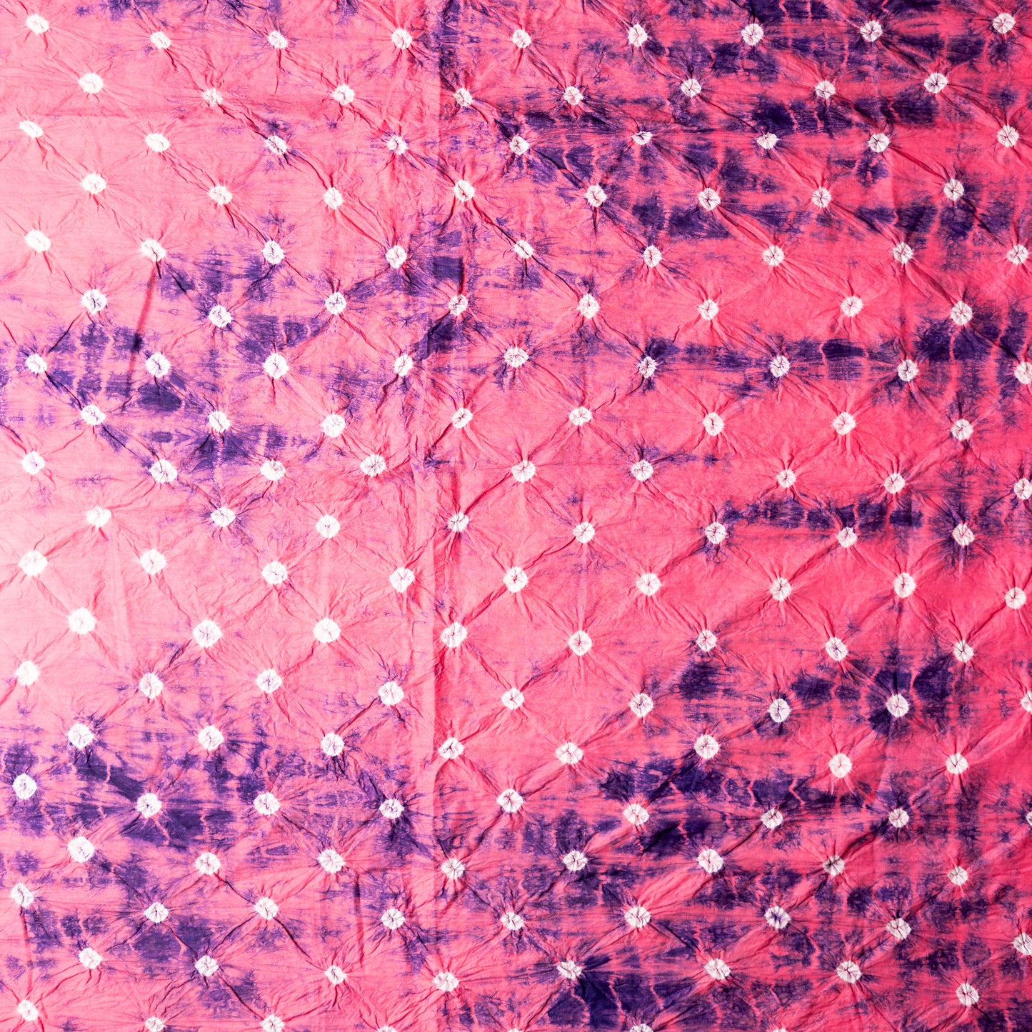 Pink color bottom with shibori designs in blue.