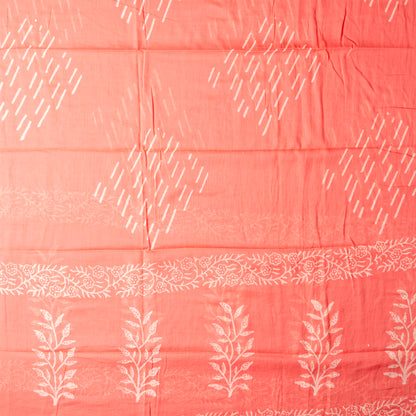 Mul cotton dupatta in peach color with matching print design.