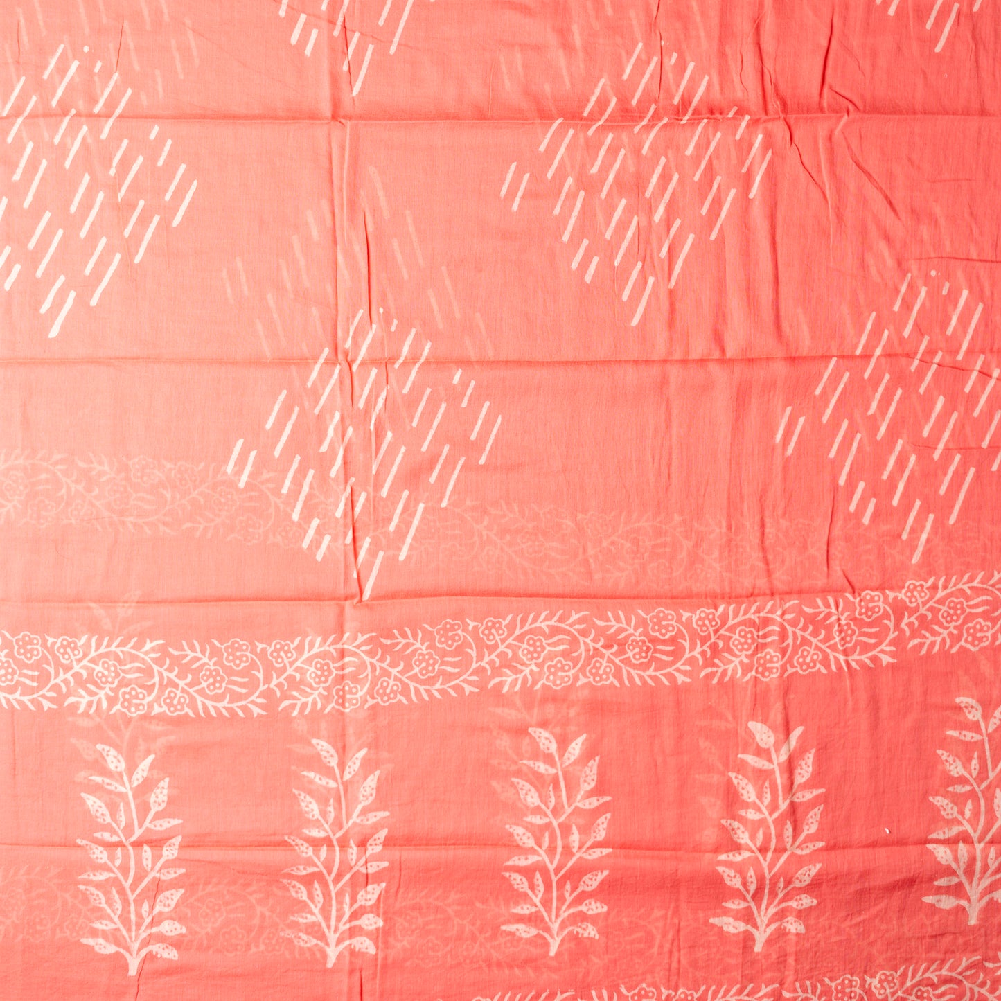 Mul cotton dupatta in peach color with matching print design.