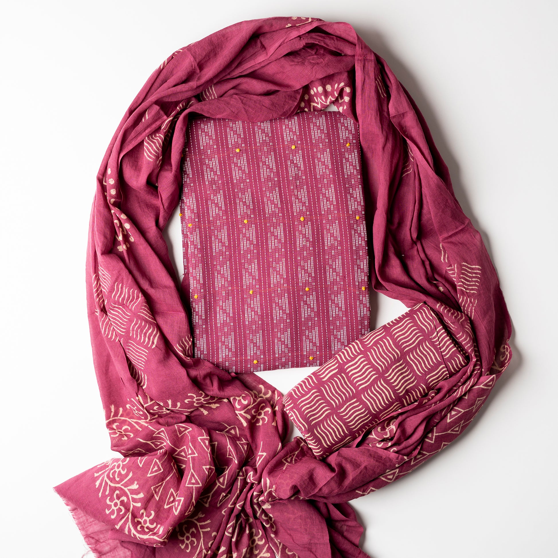 Cotton wine color top with katha work , cotton bottom with print design, mul cotton dupatta with matching print design.