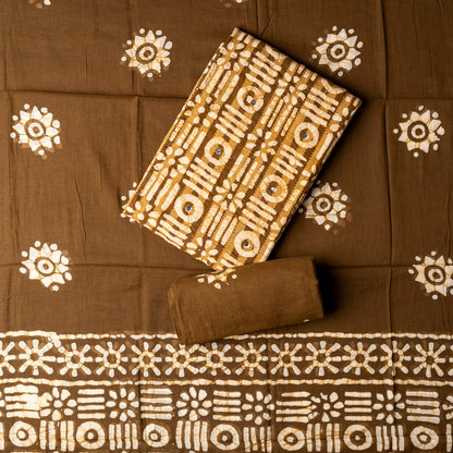 Cotton dress material, Brown color top with mirror work, katha work and prints, brown color mul cotton dupatta with print designs. cotton brown color bottom with print designs.