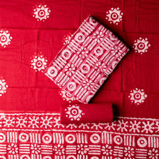 Cotton dress material, Red color top with mirror work, katha work and prints, red color mul cotton dupatta with print designs. cotton red color bottom with print designs.