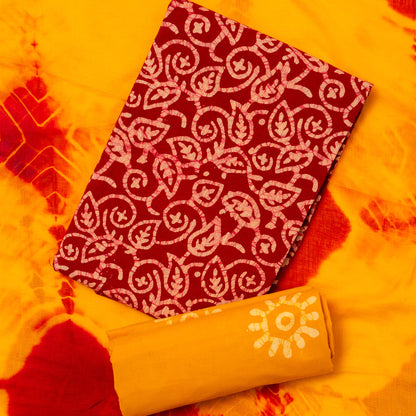 cotton red color batik top with batik prints, yellow bottom with batik prints, naznin dupatta with red and yellow color