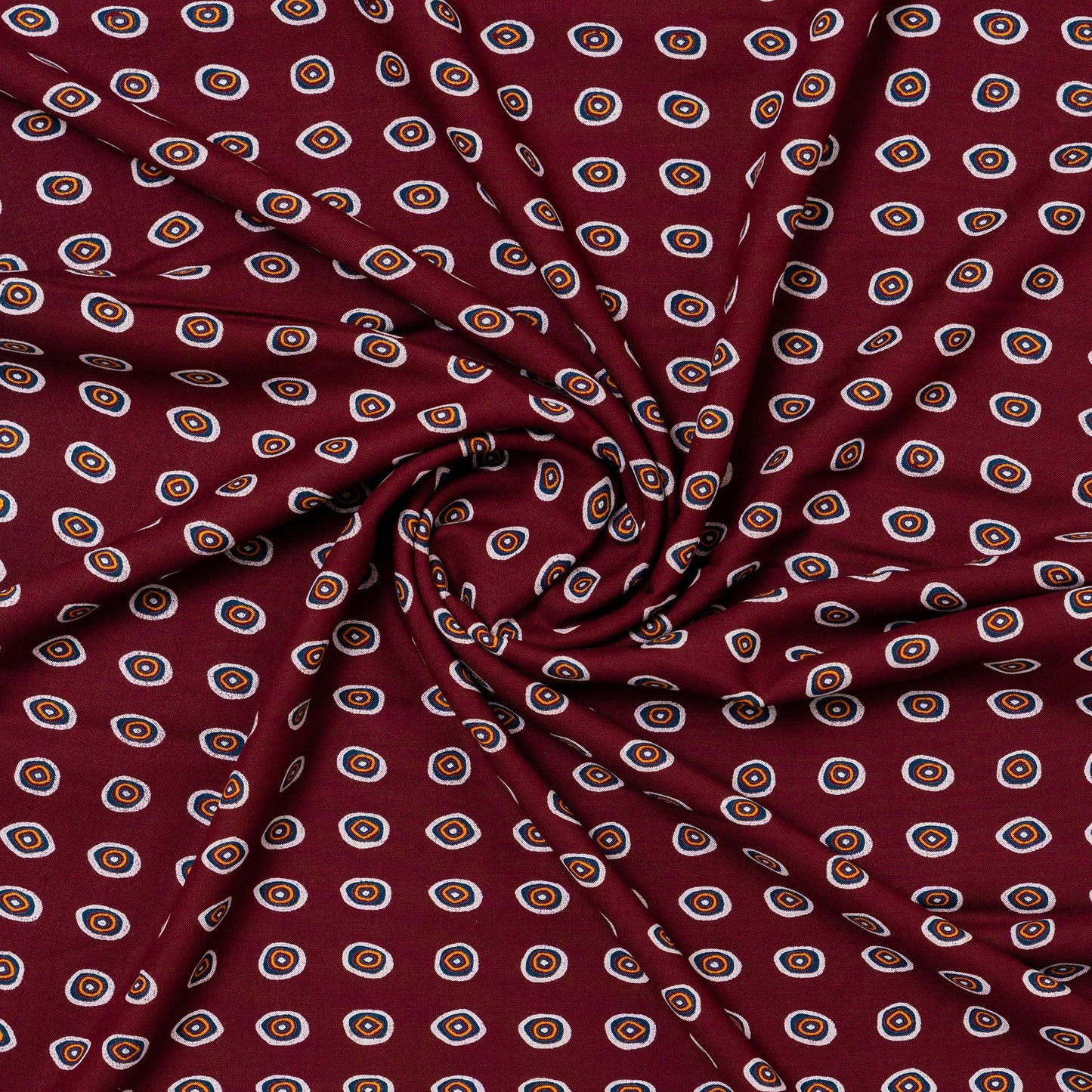 wine color rayon fabric with round designs