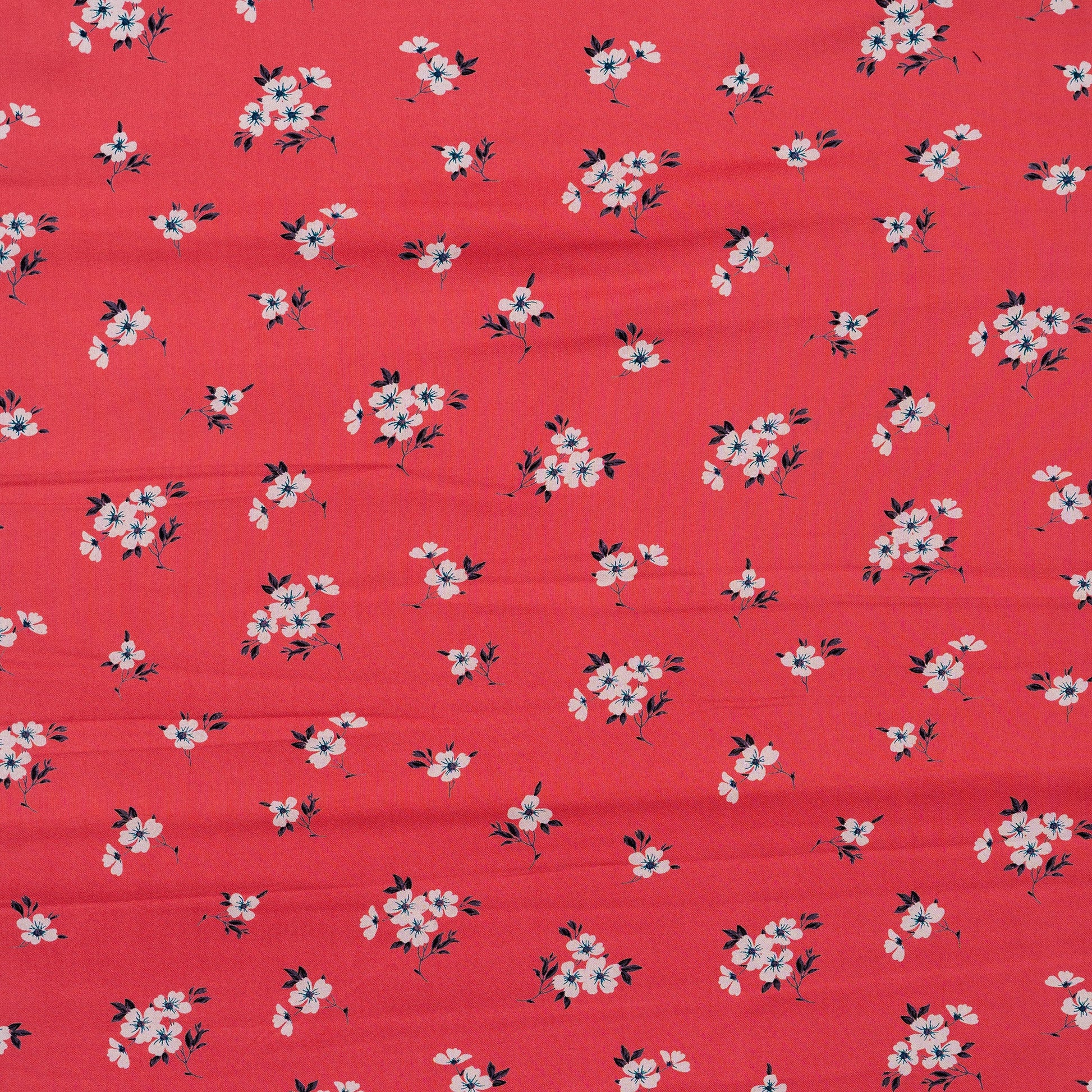 floral design printed rayon fabric in peach color