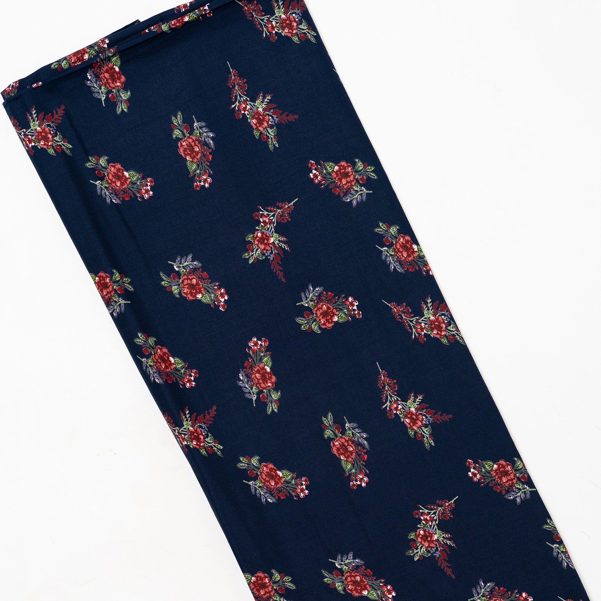 Navy blue color rayon printed fabric with floral designs in maroon and green color