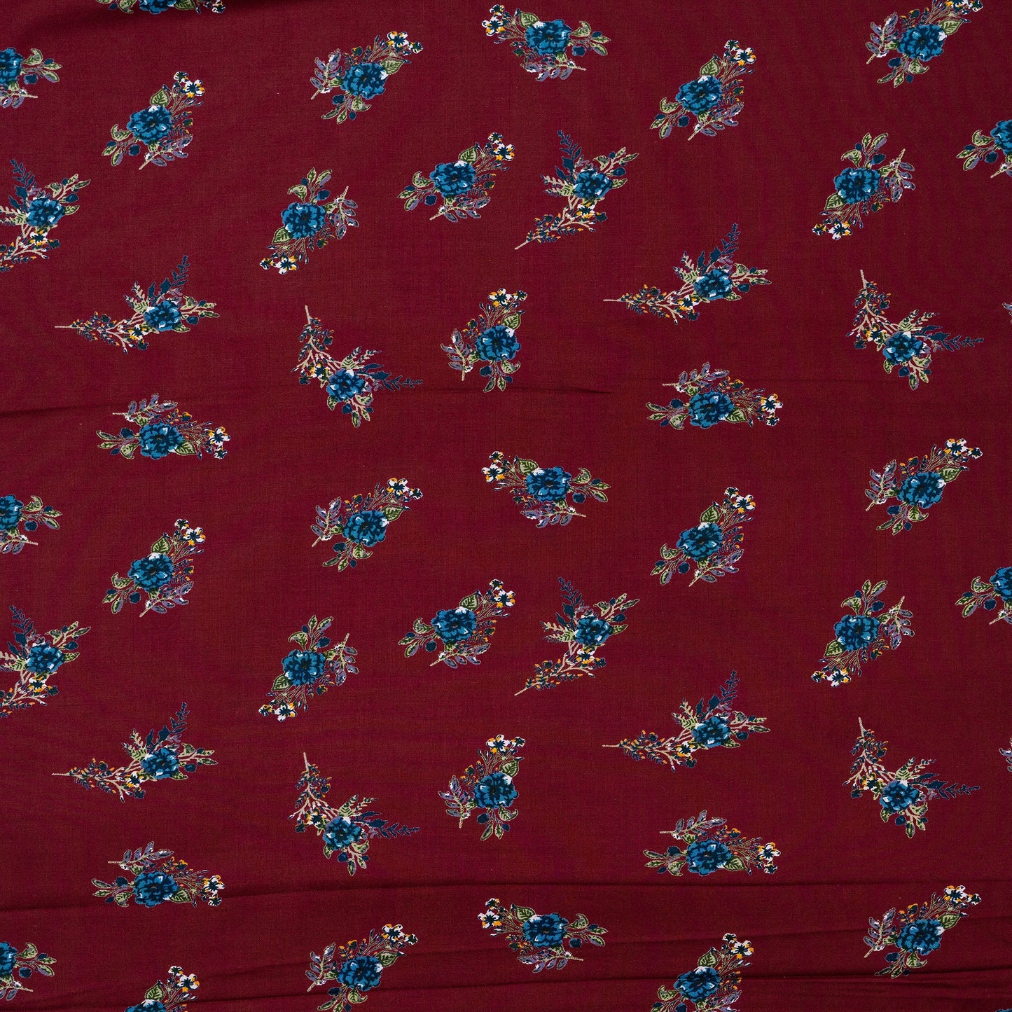 Wine color rayon printed fabric with blure and white floral prints