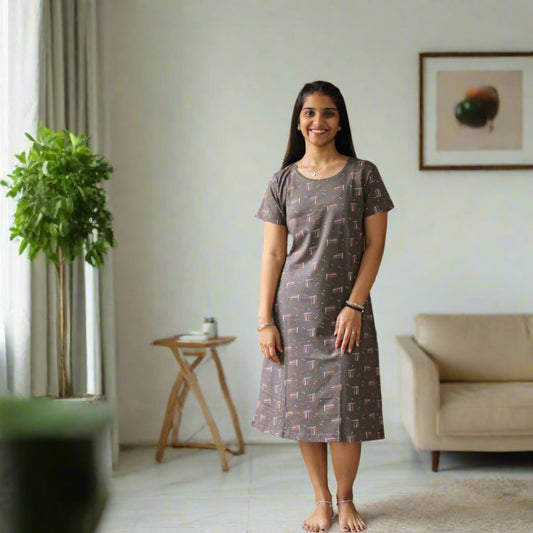 women wearing knee length printed cotton short nighty, prints all over, grey color