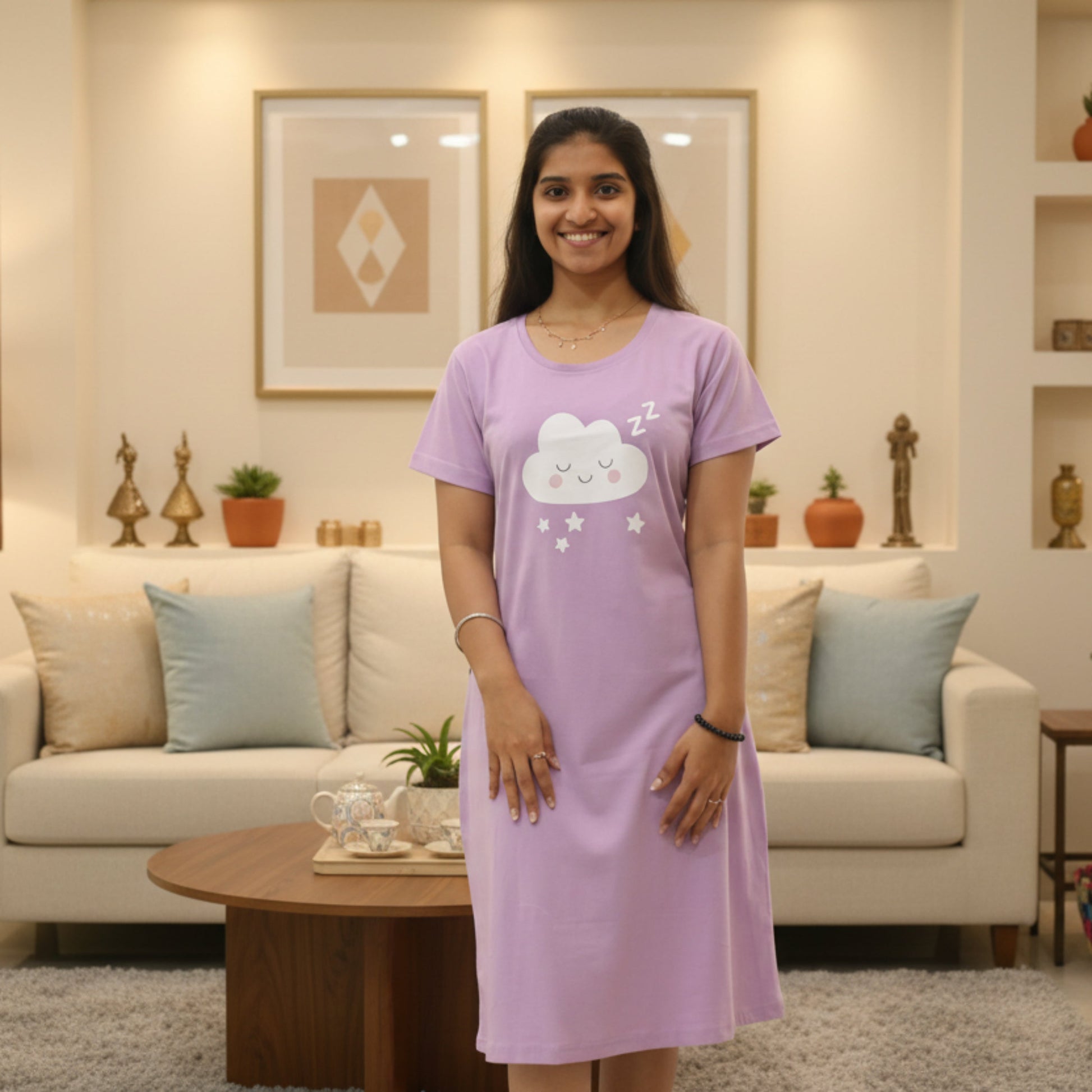 women wearing a lavender blue color cotton short nighty with cloud design printed on chest area