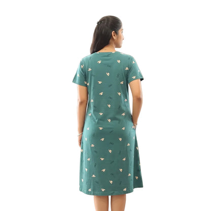 women standing backwards showing the back view of cotton knee length short nighty with all over print design