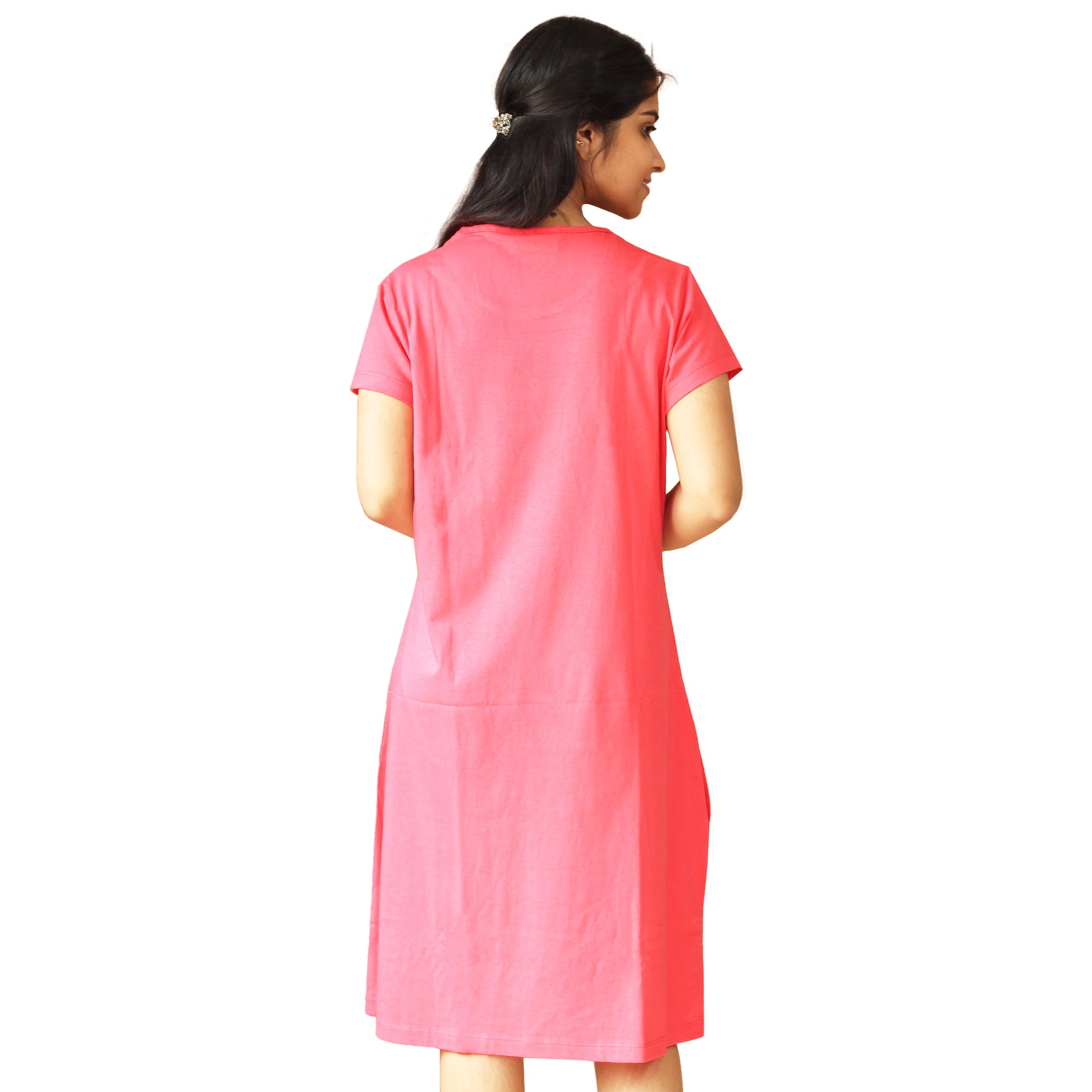back side view of knee length short nighty in coral color