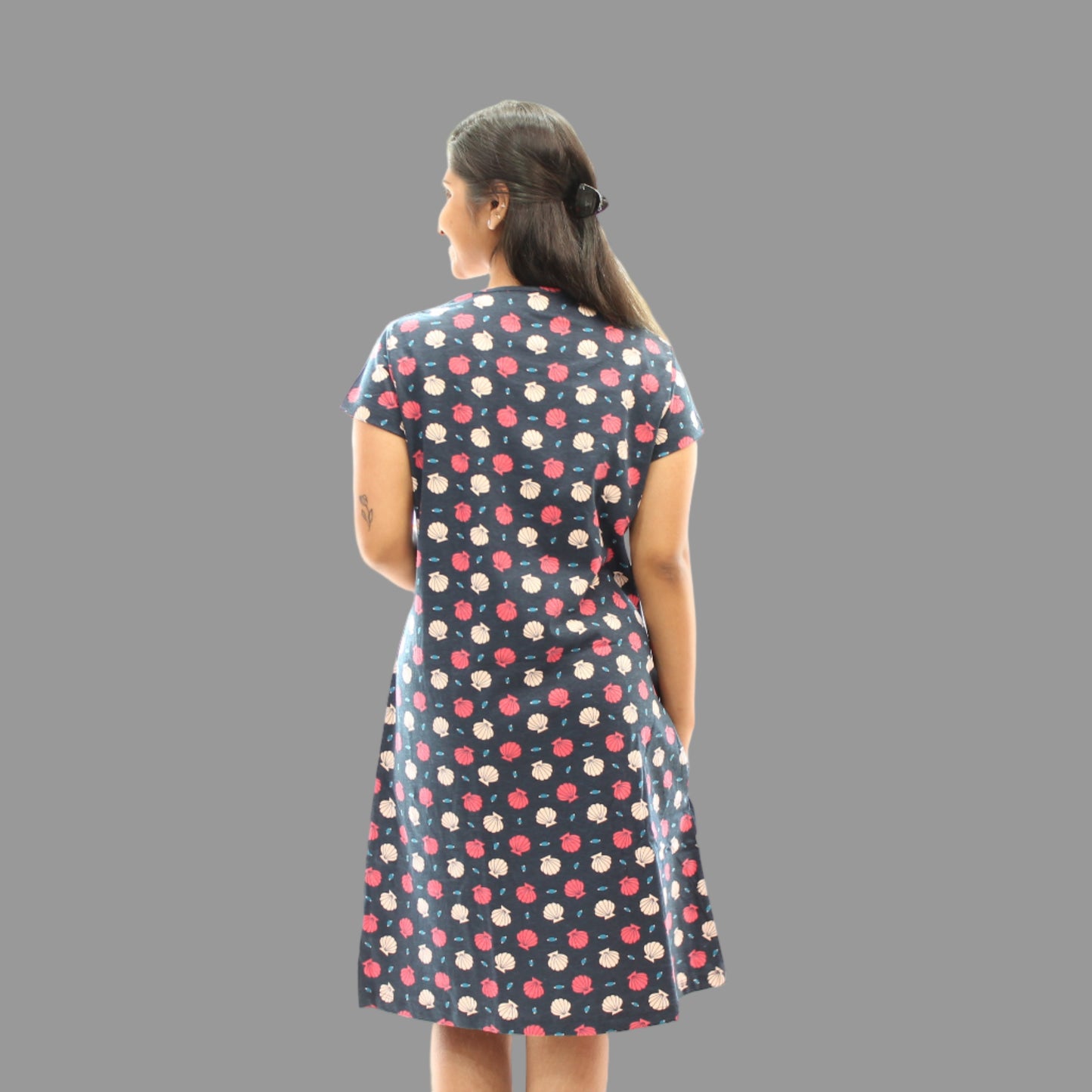 women wearing navy color cotton short nighty with floral print all over 