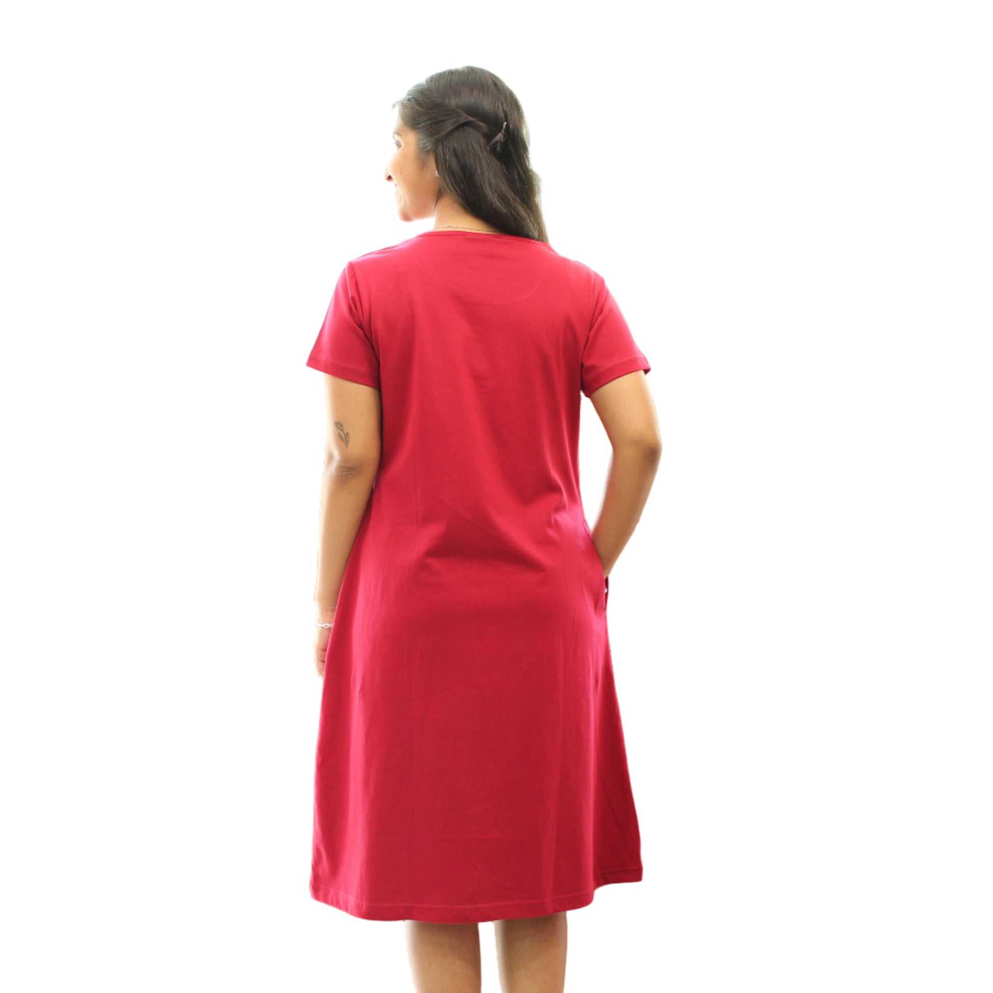 women wearing red knee length t shirt dress , standing backwards
