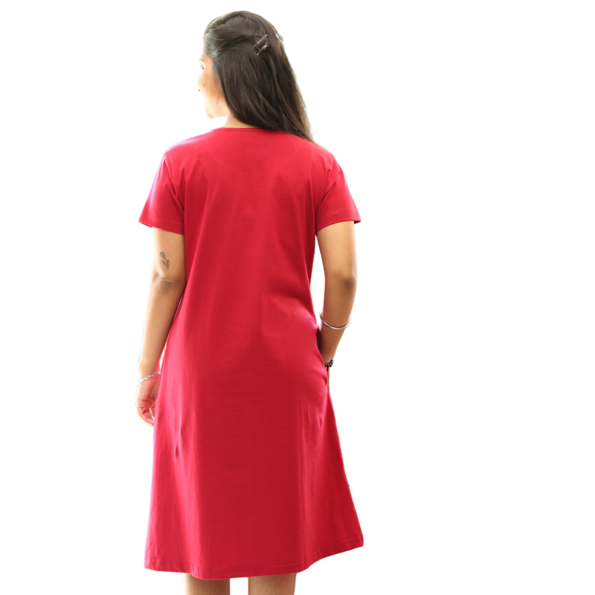 women wearing reddish maroon short nighty, standing backwards