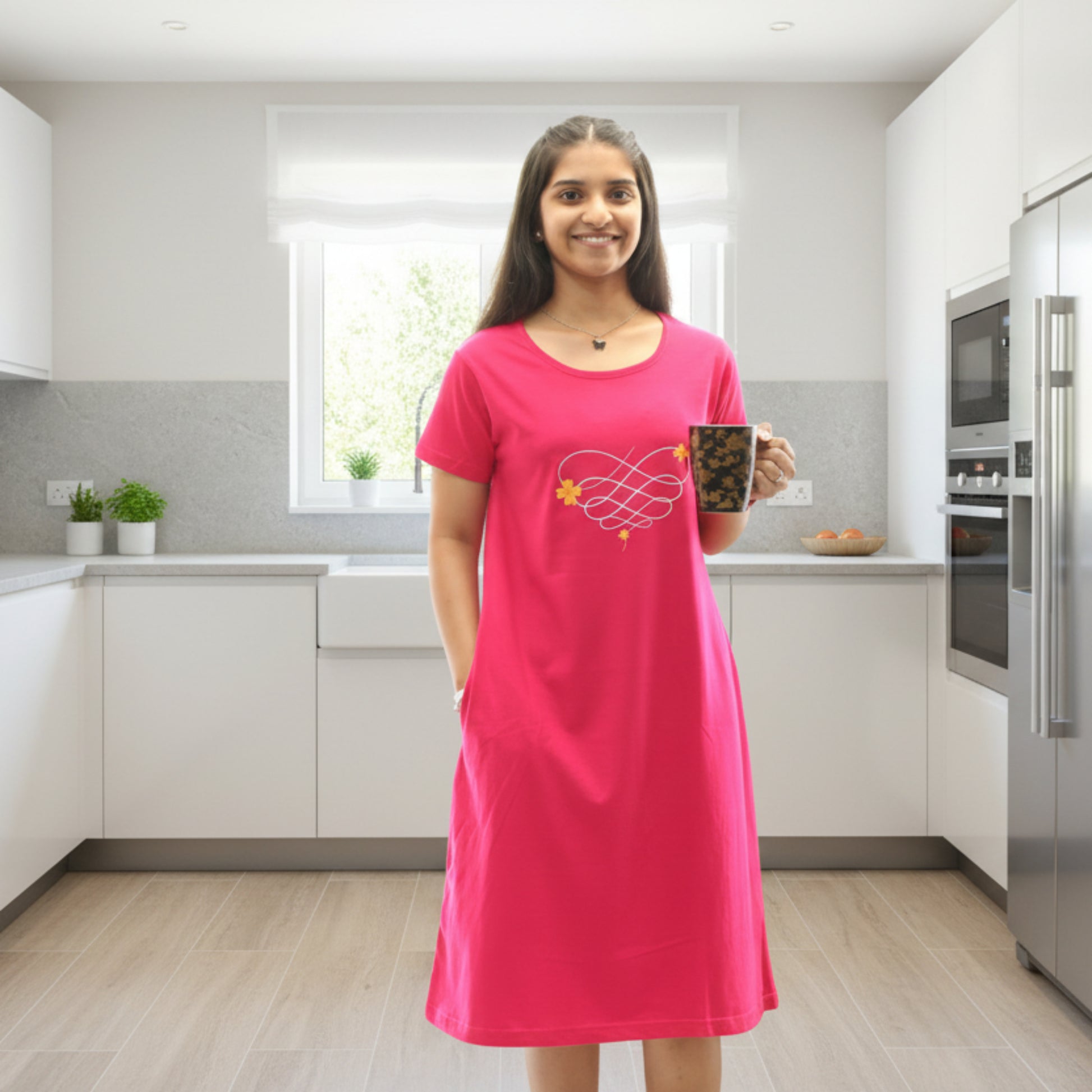 women wearing fuchsia pink cotton short nighty with pocket, holding a coffee mug 