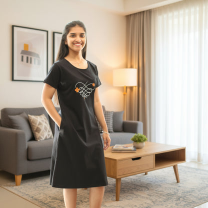 women wearing black color short gown, hands in pocket, floral print on chest area
