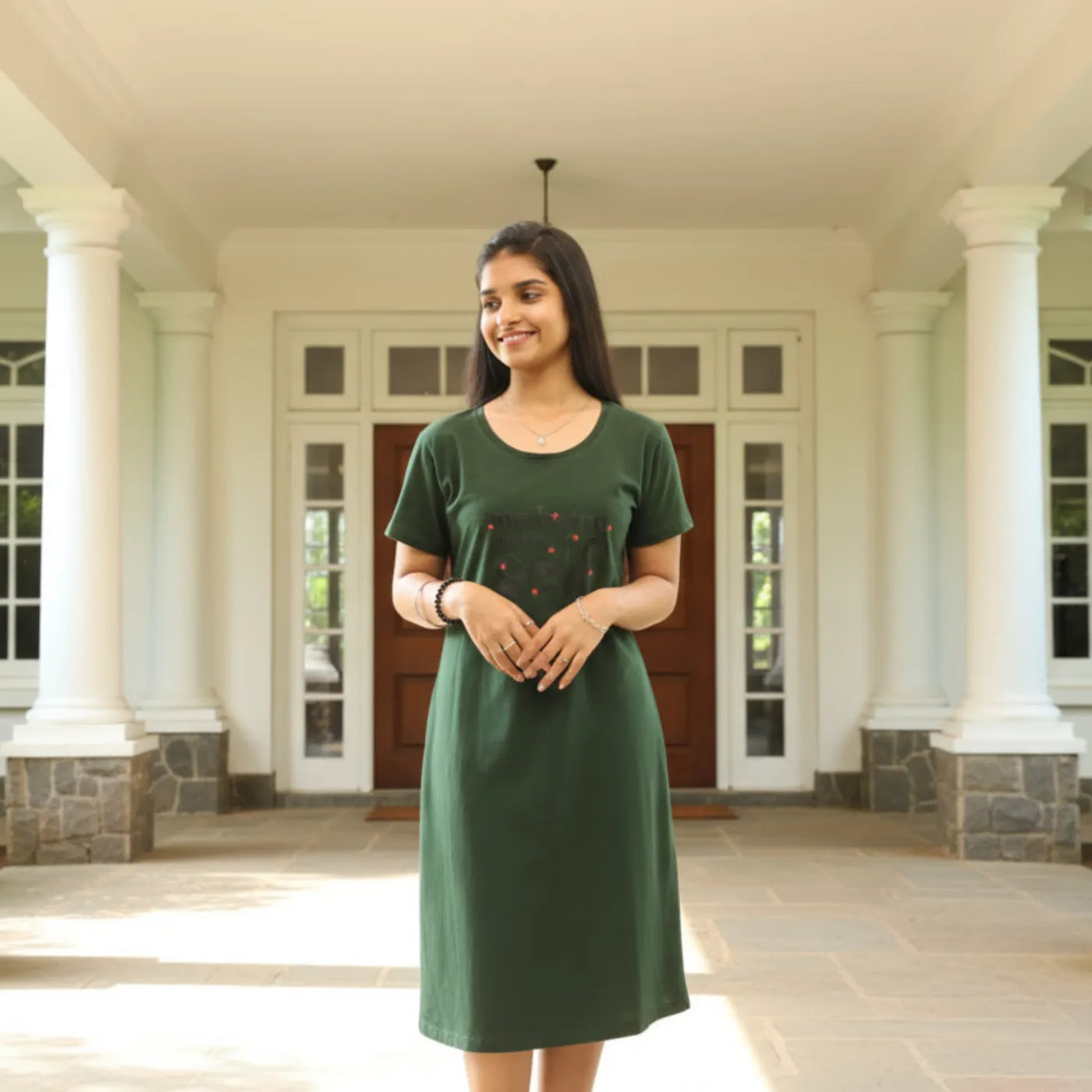 women standing in casual pose wearing green color cotton short nighty