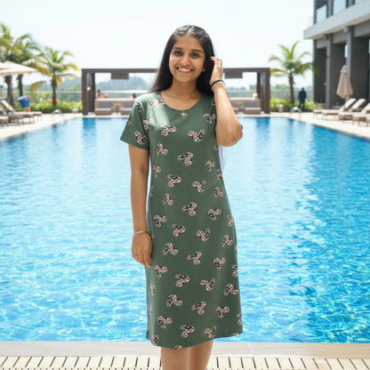 women wearing light green color short nighty with all over prints