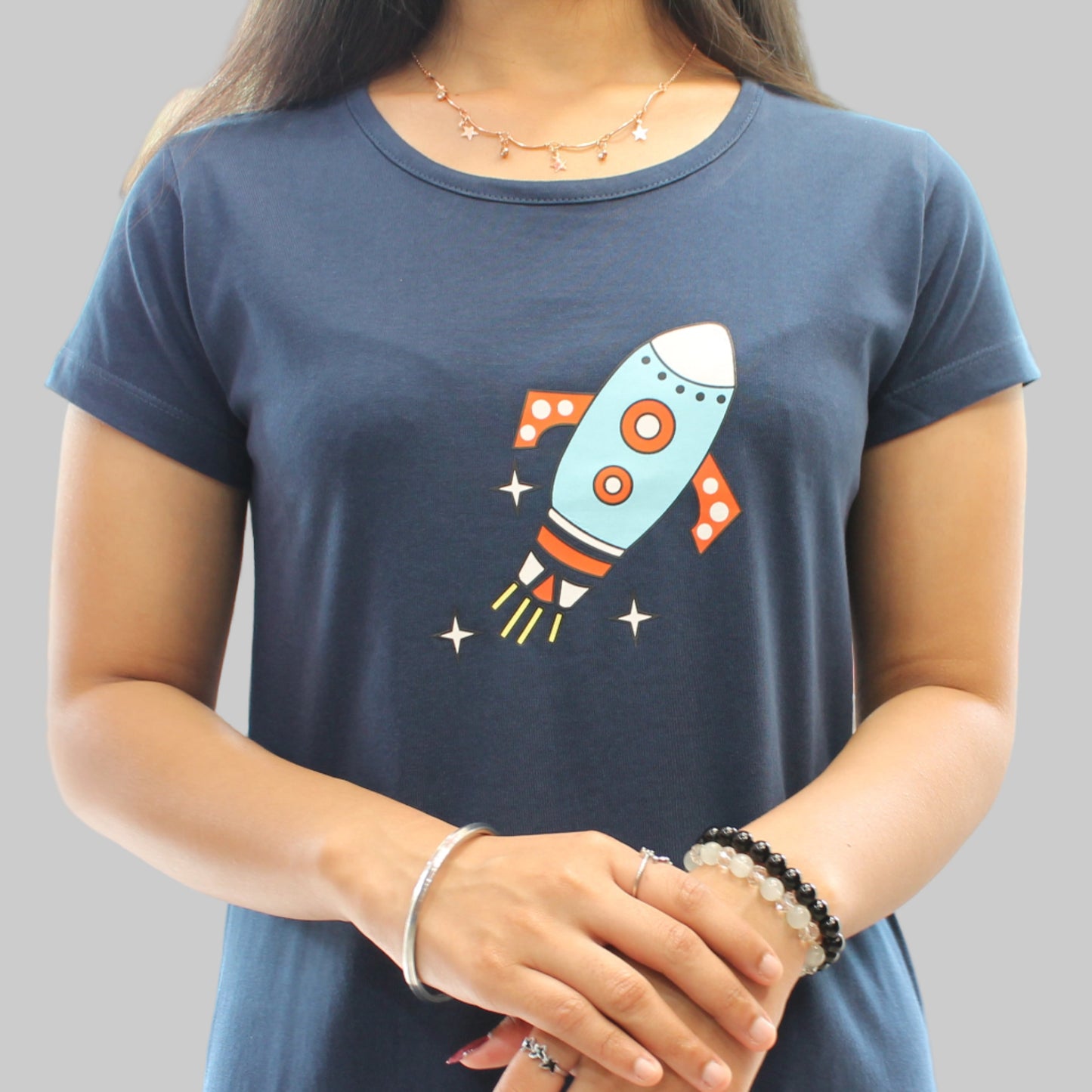 close up view of navy blue cotton short nighty with rocket design printed on chest area