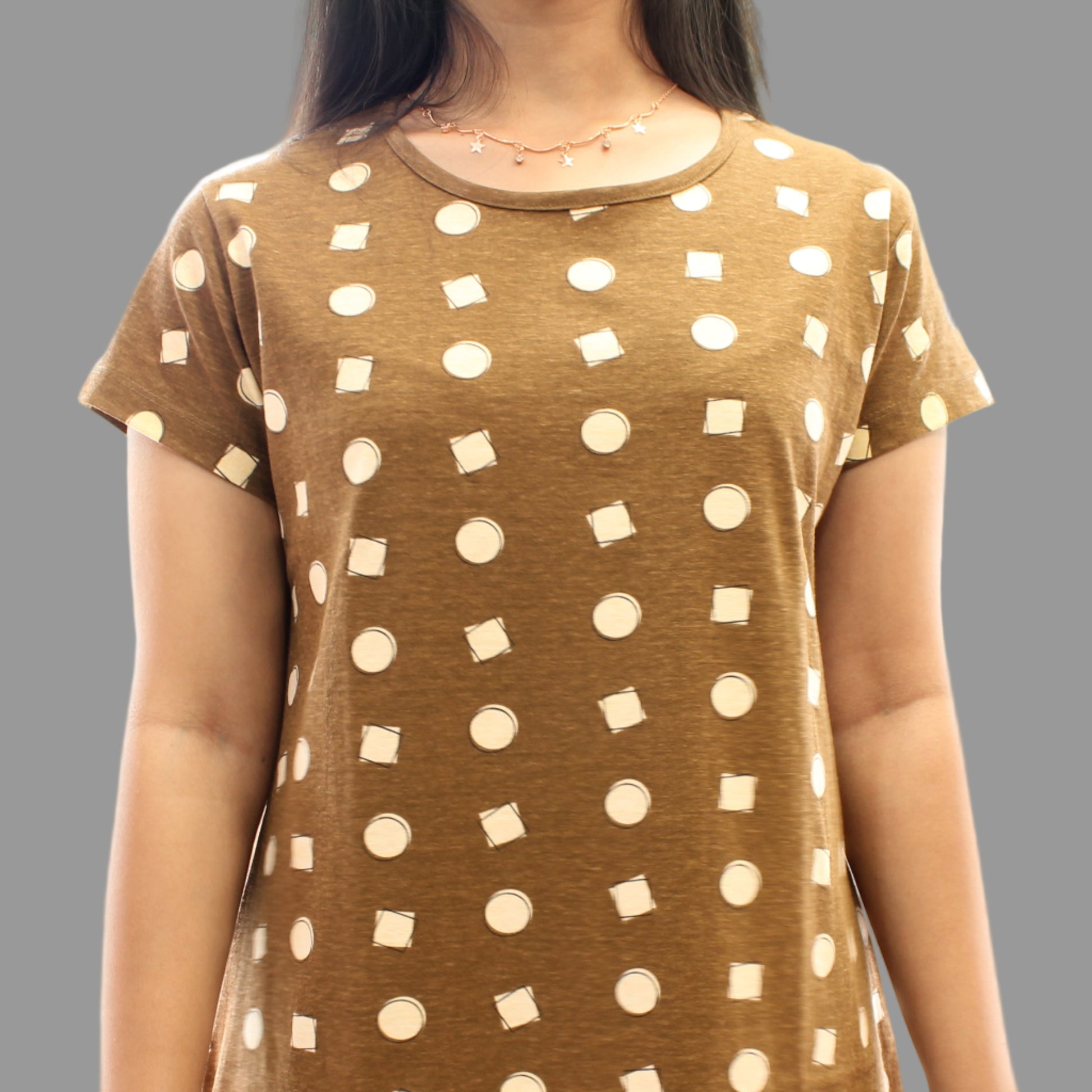 close up view of brown printed short nighty with geometric print designs