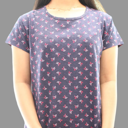 close up view of navy night short gown with all over print 