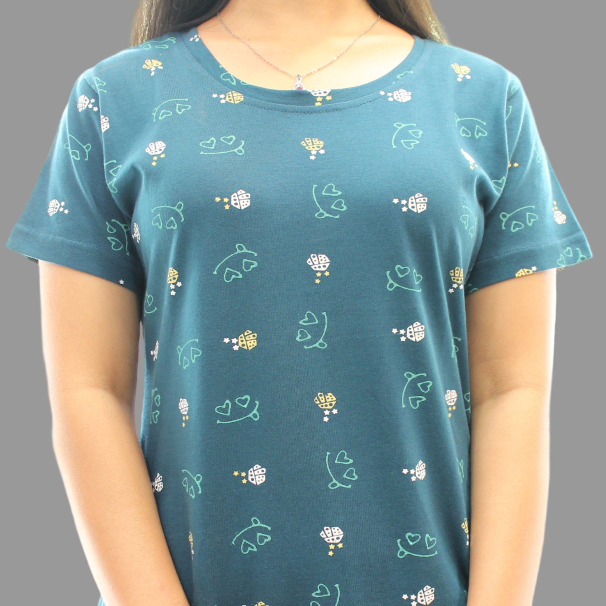 close up view of fabric for teal color cotton short nighty with all over print