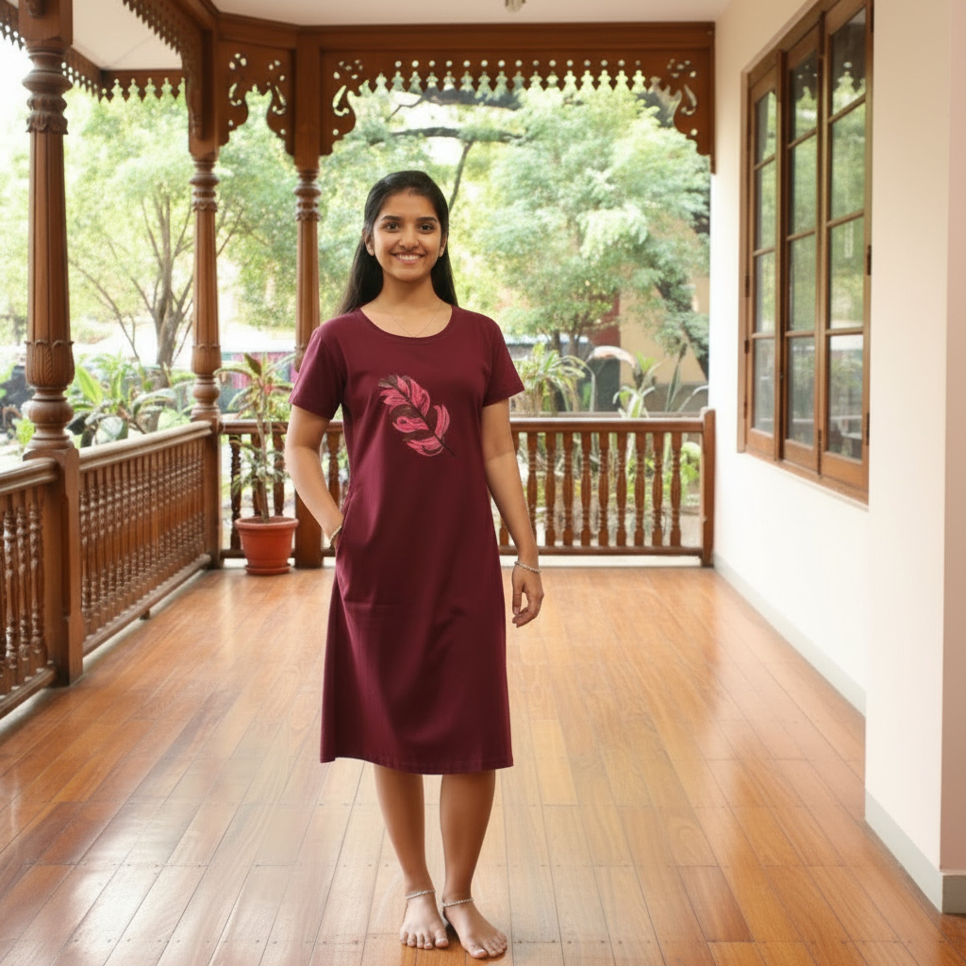 women wearing dark wine cotton short nighty with hands in pocket