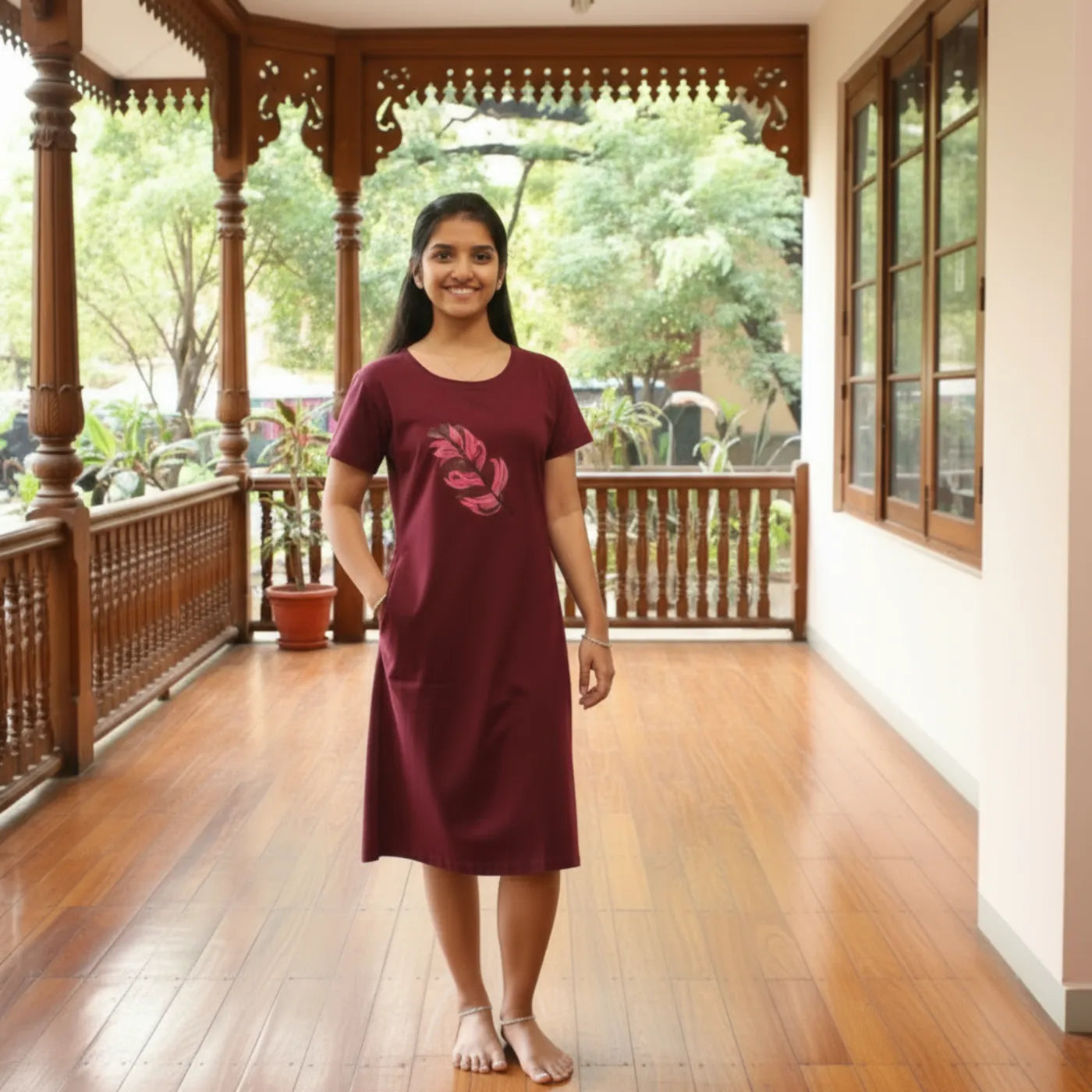 women wearing dark wine cotton short nighty with hands in pocket