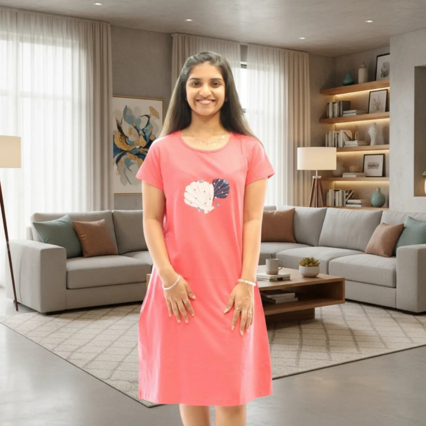 women wearing cotton knee length short nighty in coral color, floral print in chest area