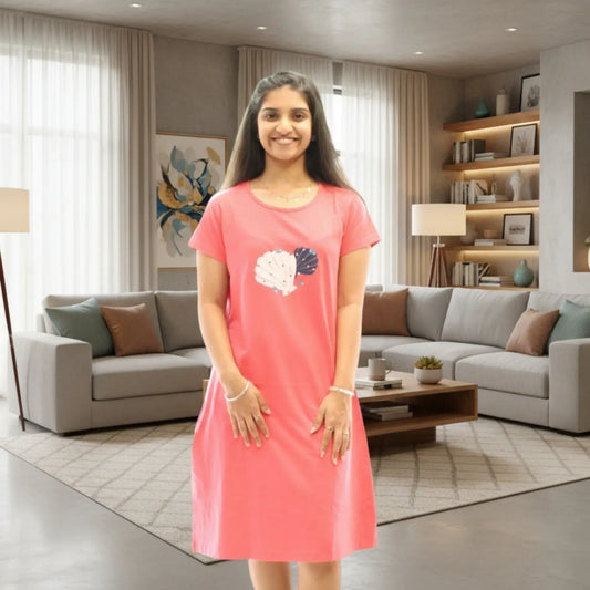 women wearing cotton knee length short nighty in coral color, floral print in chest area