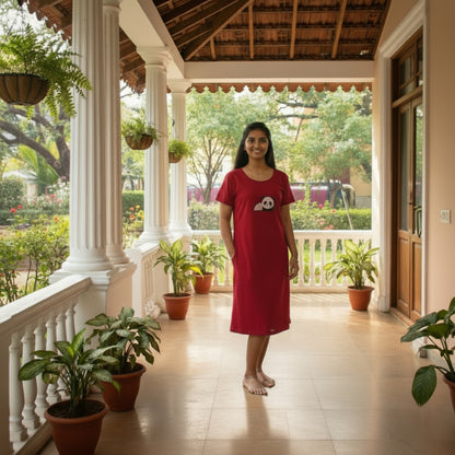 women wearing reddish maroon cotton short nighty with hands in pocket 