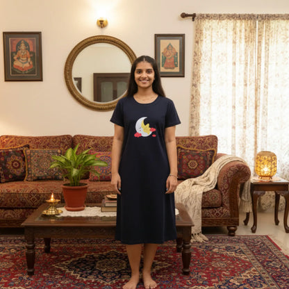 women wearing dark navy color cotton knee length short nighty with pocket, moon design print on chest area